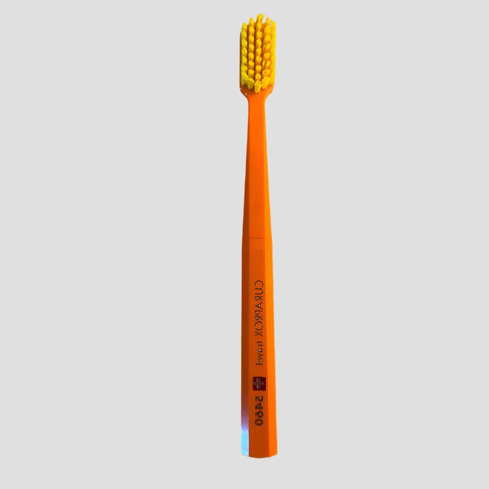 Compact Orange Travel Toothbrush with Protective Case